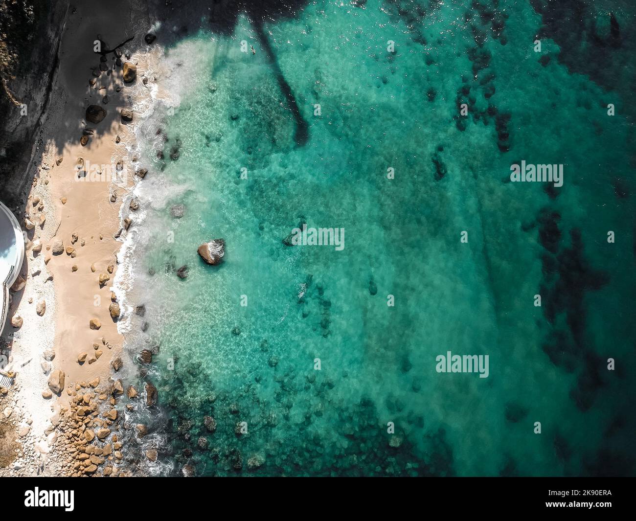 An aerial view of clear turquoise water of Hidden Beach in Puerto