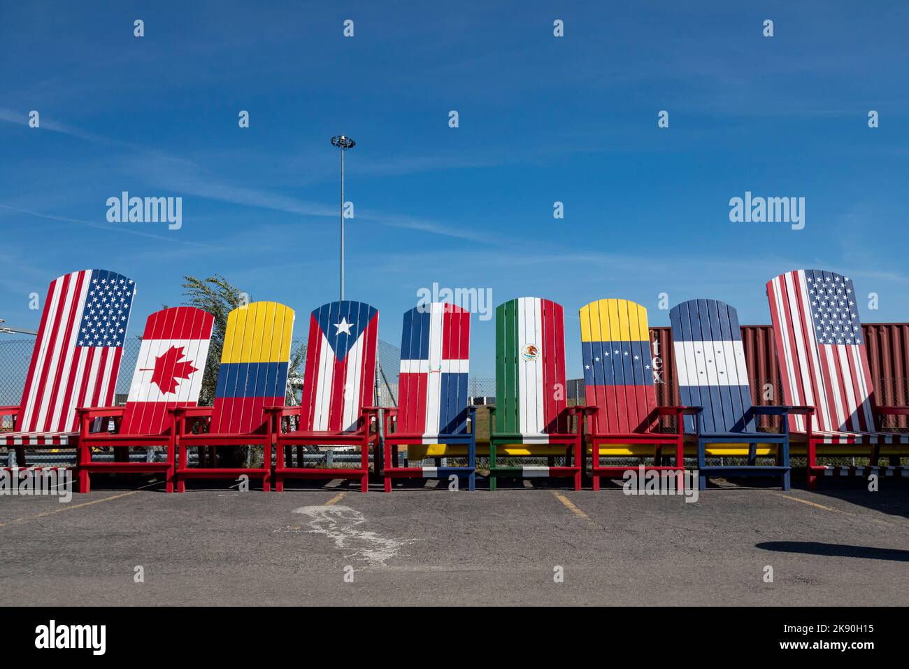 Detroit, Michigan - Large chairs painted as flags outside the Poronga Splash car wash in southwest Detroit. The flags represent the home countries of Stock Photo