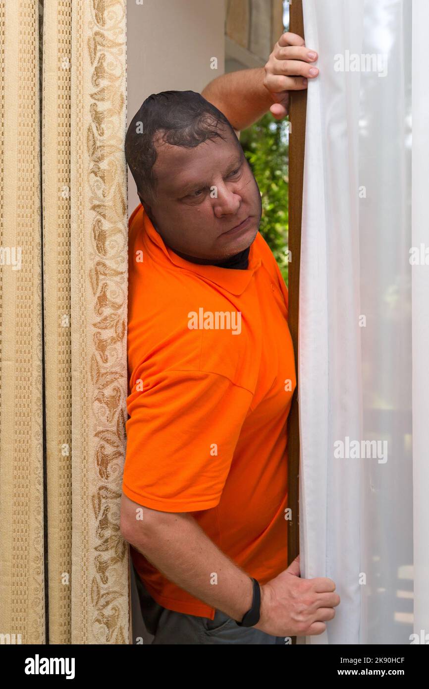 perpetrator entered house through an open balcony. Stock Photo