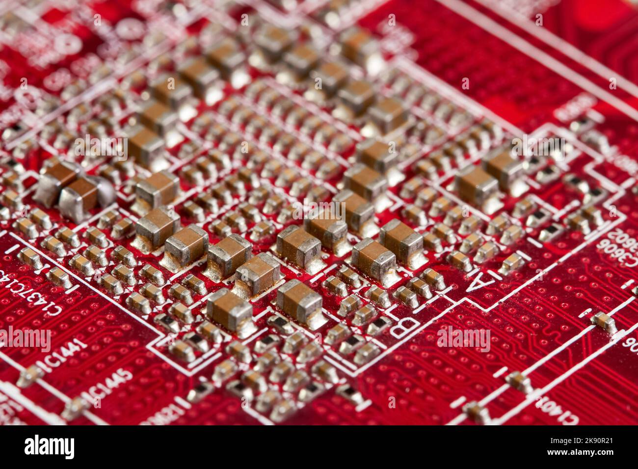 Resistors, capacitors, transistors on an electronic computer printed circuit board Stock Photo