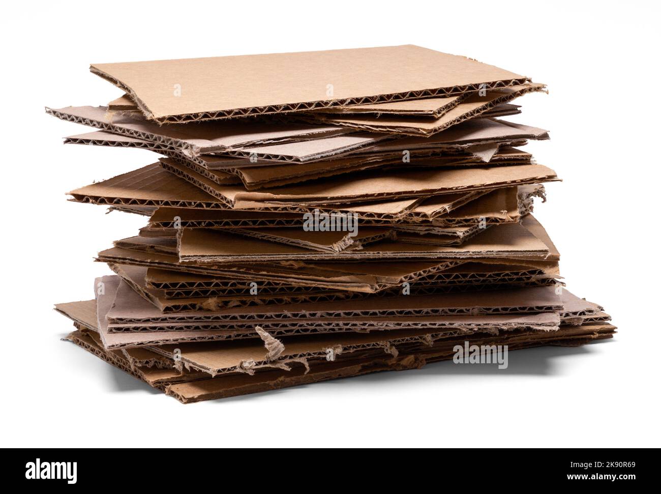 Cardboard Pieces Pile Cut Out on White. Stock Photo