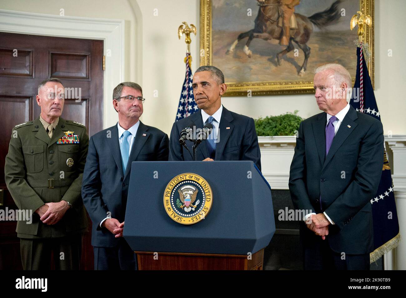 United States President Barack Obama announces he will keep 5,500 US troops in Afghanistan when he leaves office in 2017 and explains his reasoning for that action in the Roosevelt Room of the White House in Washington, DC on Thursday, October 15, 2015. From left to right: US Marine Corps General Joseph F. Dunford, Chairman, Joint Chiefs of Staff; US Secretary of Defense Ashton Carter; the President, and US Vice President Joe Biden. Credit: Ron Sachs/Pool via CNP Stock Photo