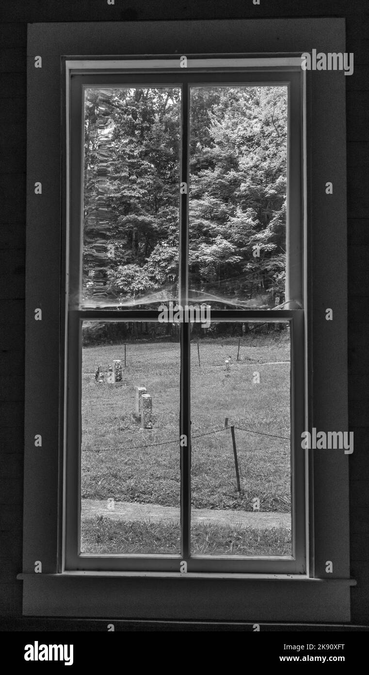 Window Map Greyscale A vertical grayscale shot of a window with a view of a park Stock Photo ...