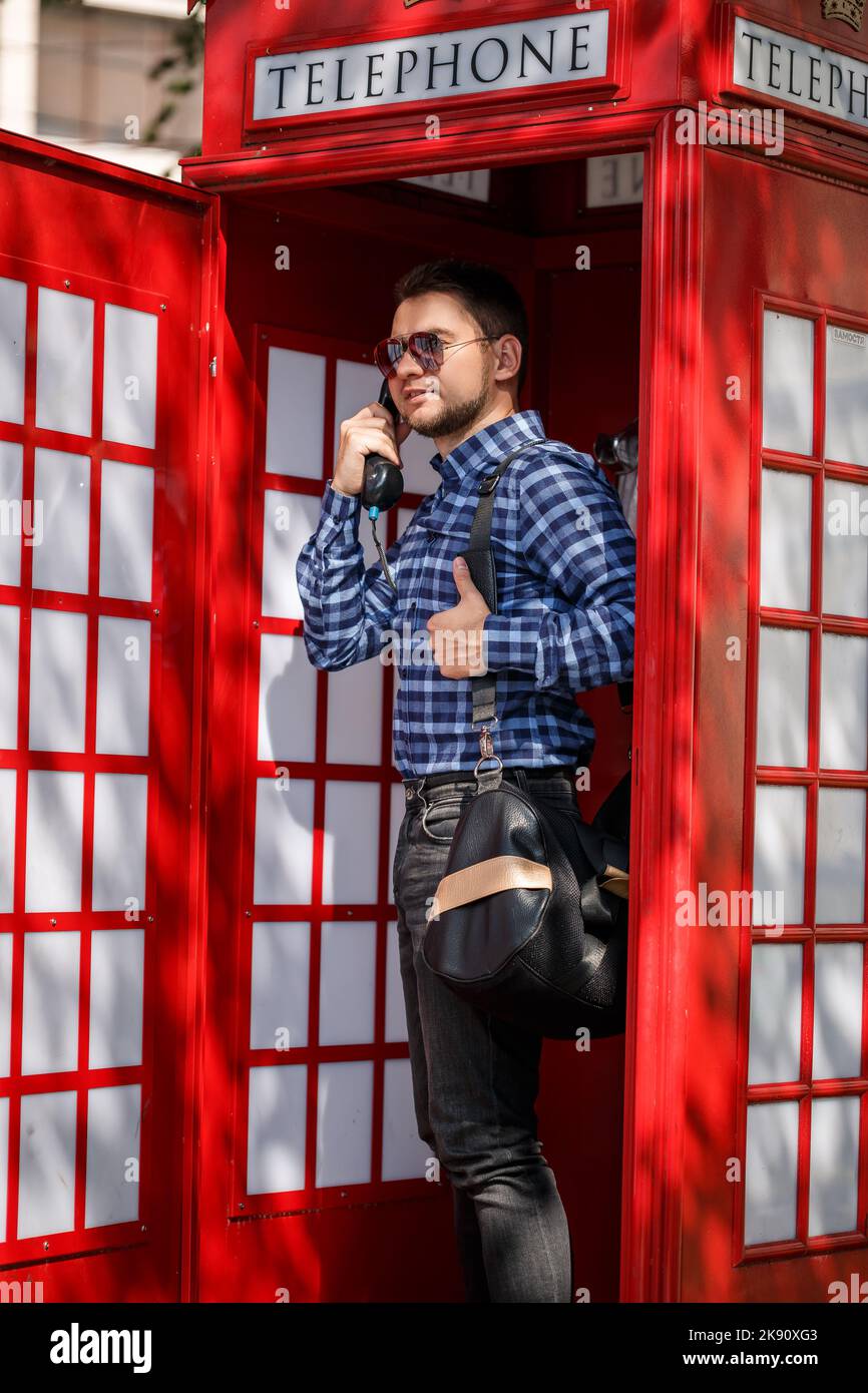 Man talking in a phone booth hi-res stock photography and images - Alamy