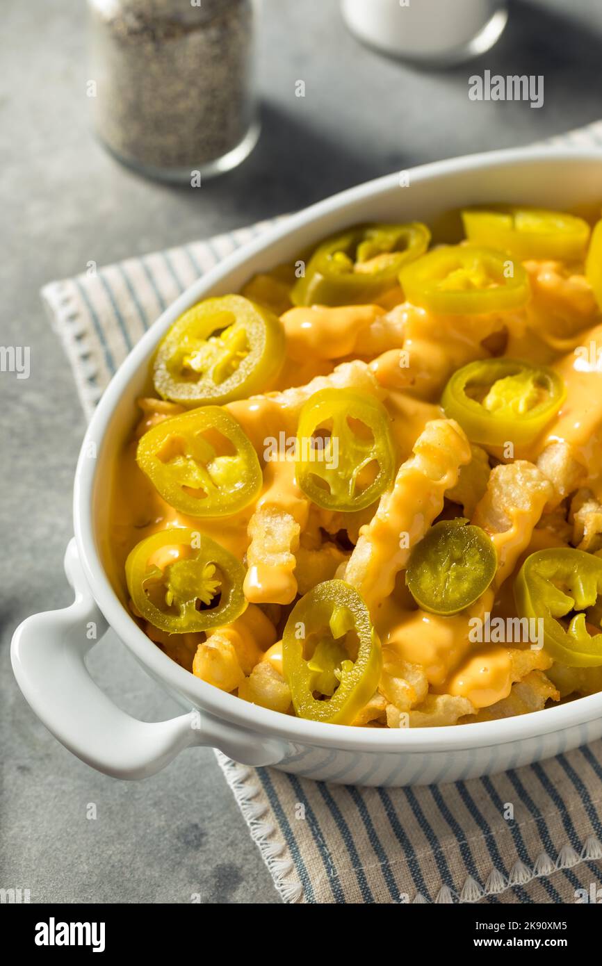 Homemade Queso Cheese French Fries with Jalapenos Stock Photo Alamy