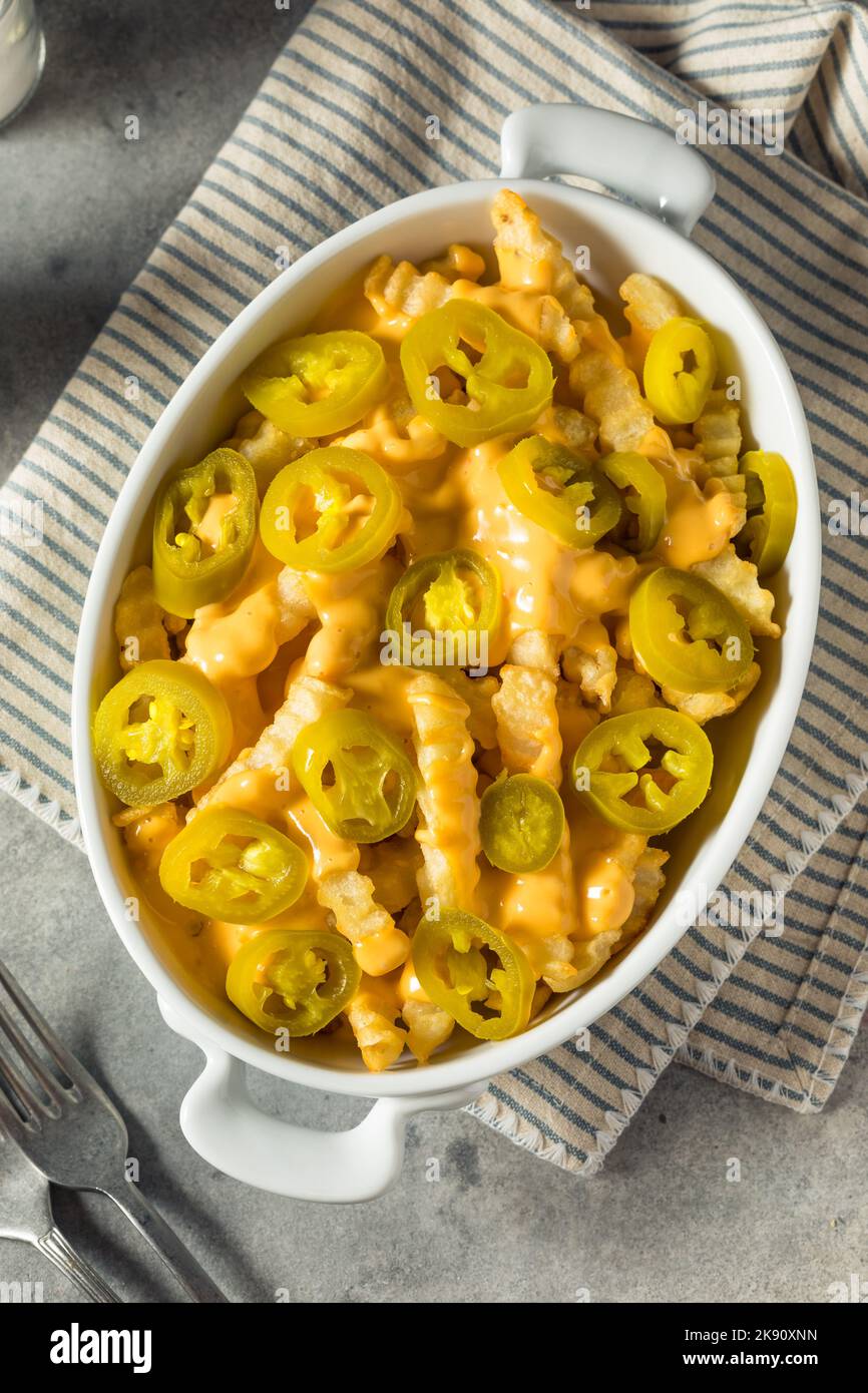 Homemade Queso Cheese French Fries with Jalapenos Stock Photo Alamy