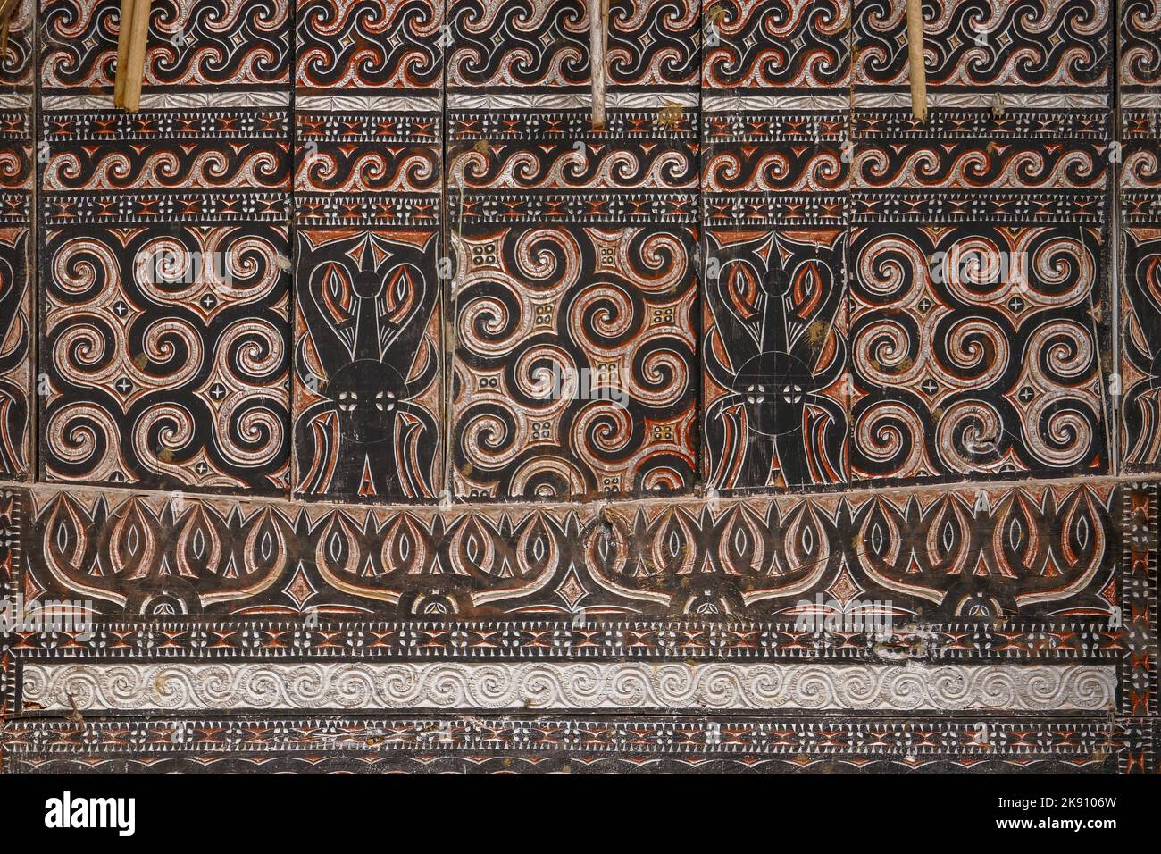 Beautiful Toraja ethnic design and pattern carved and painted on tongkonan traditional house in Bori village, South Sulawesi, Indonesia Stock Photo