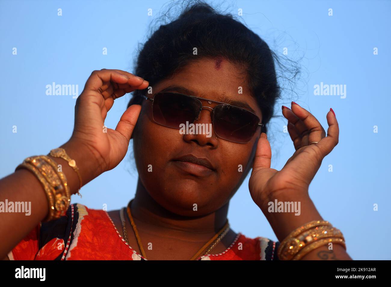 Chennai, Tamil Nadu, India. 25th Oct, 2022. An Indian woman uses