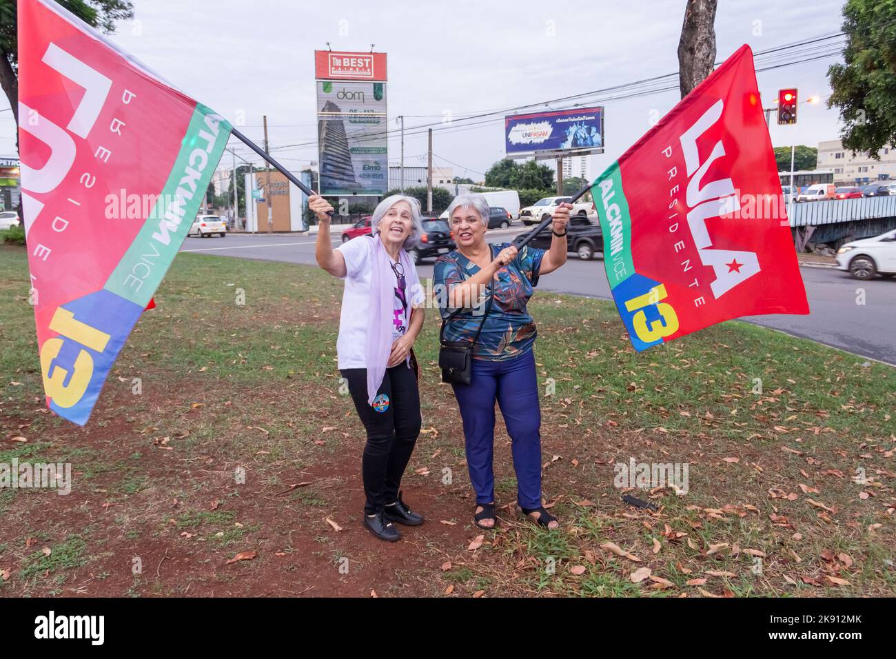 Goiânia, Goias, Brazil – October 21, 2022: Two women holding flags in an act in favor of Lula - Brazil's presidential candidate. Stock Photo