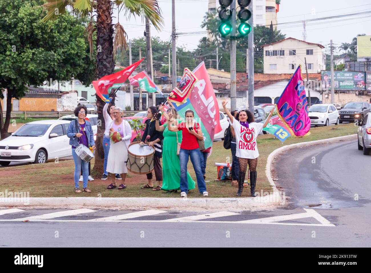 Goiânia, Goias, Brazil – October 21, 2022: Several people in action on the street with Lula's red flags. Stock Photo