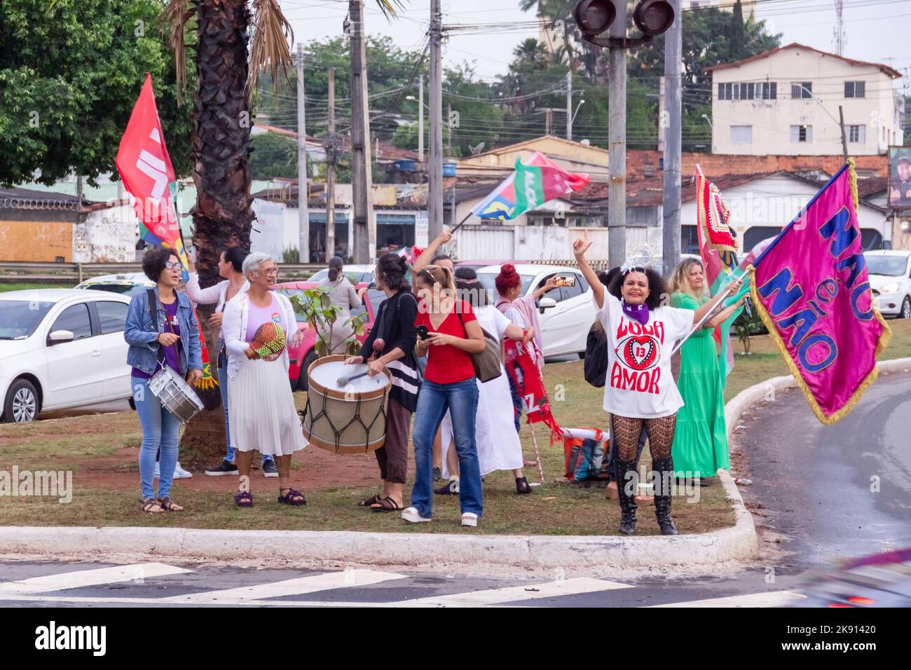 Goiânia, Goias, Brazil – October 21, 2022: Several people gathered, holding flags in an act in favor of Lula - candidate for the presidency of Brazil. Stock Photo