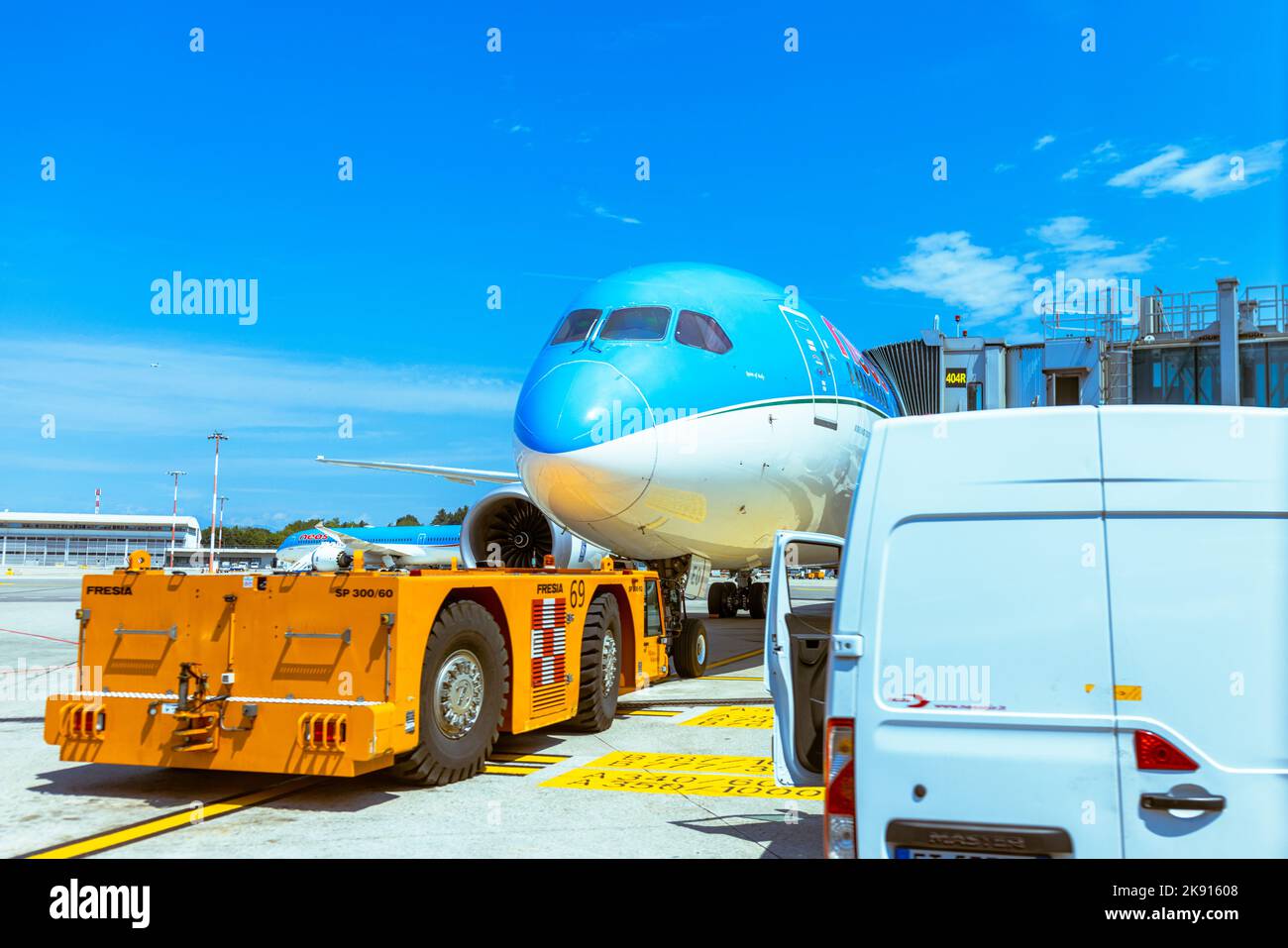 A plane preparing for flight in the airport Malpensa, Milan Stock Photo ...