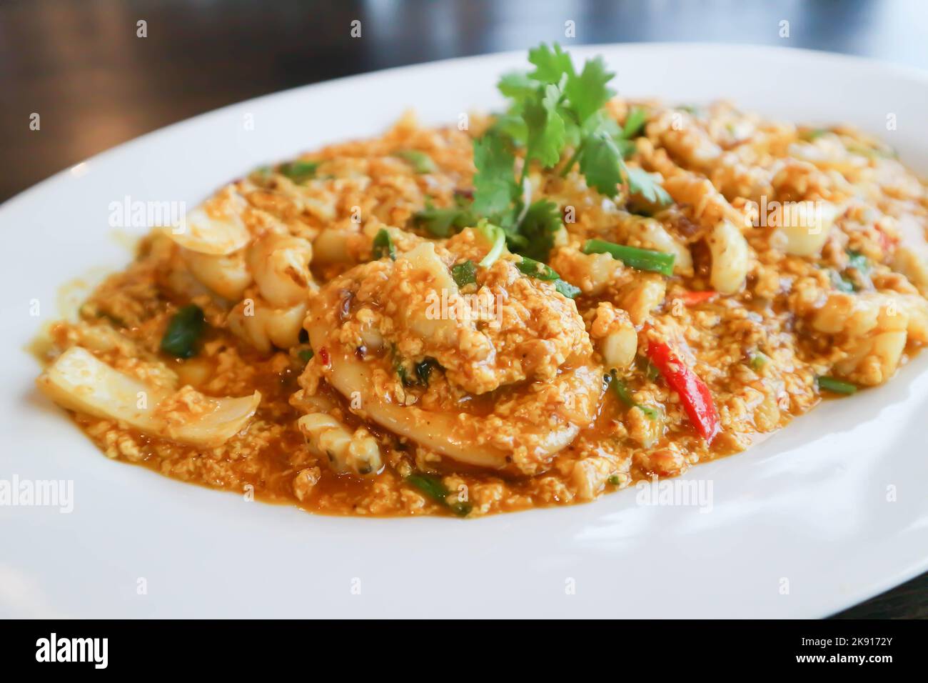 stir fried seafood in curry powder, stir fried squid in yellow curry