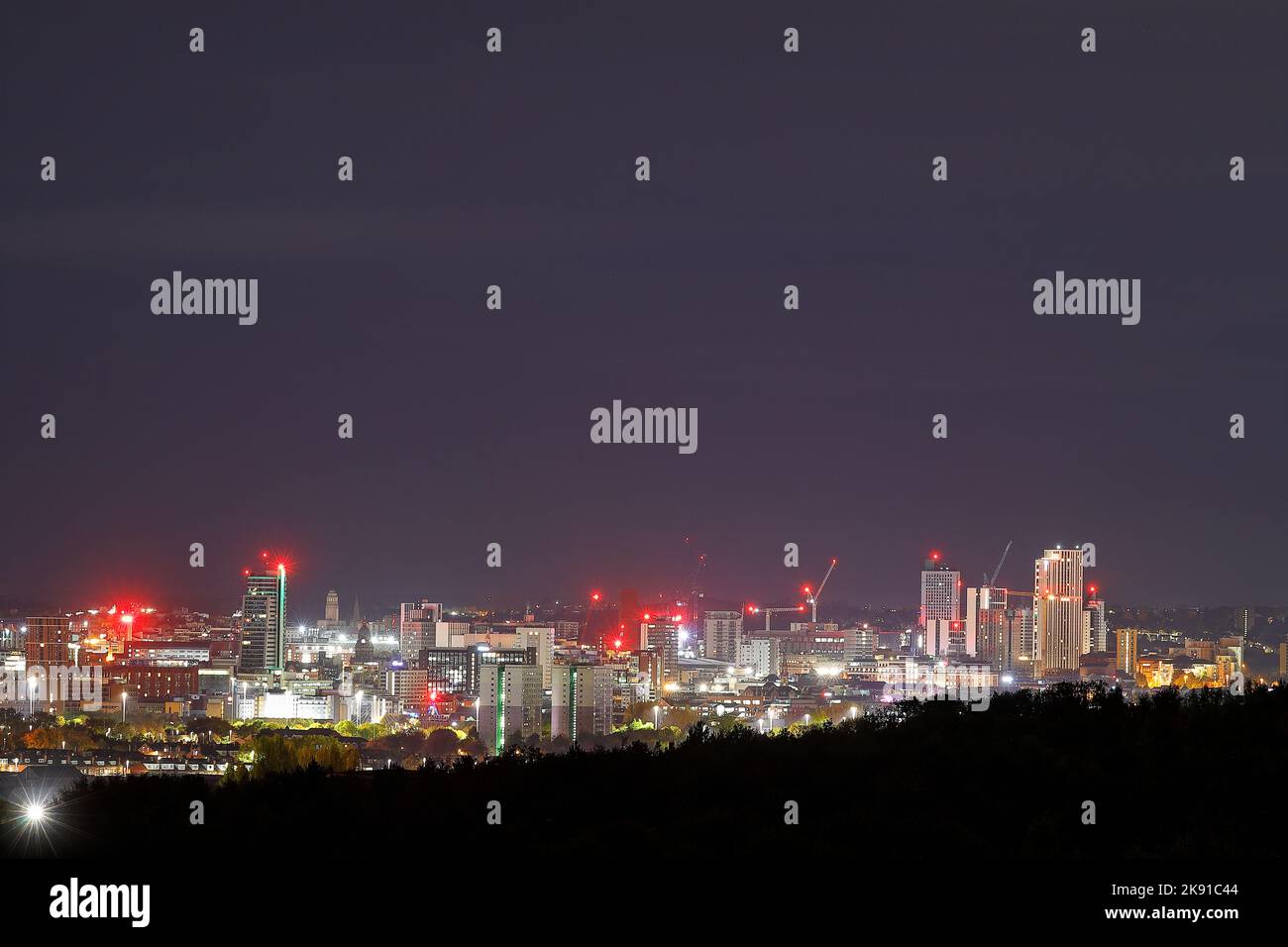 A view of Leeds City Centre at night from Middleton Park Stock Photo