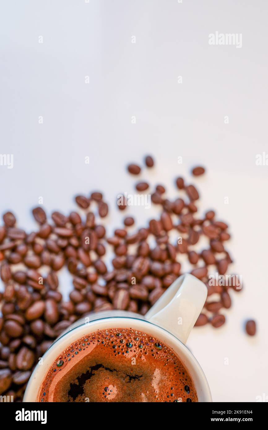 coffee beans on a white background with a cup of black coffee Stock ...