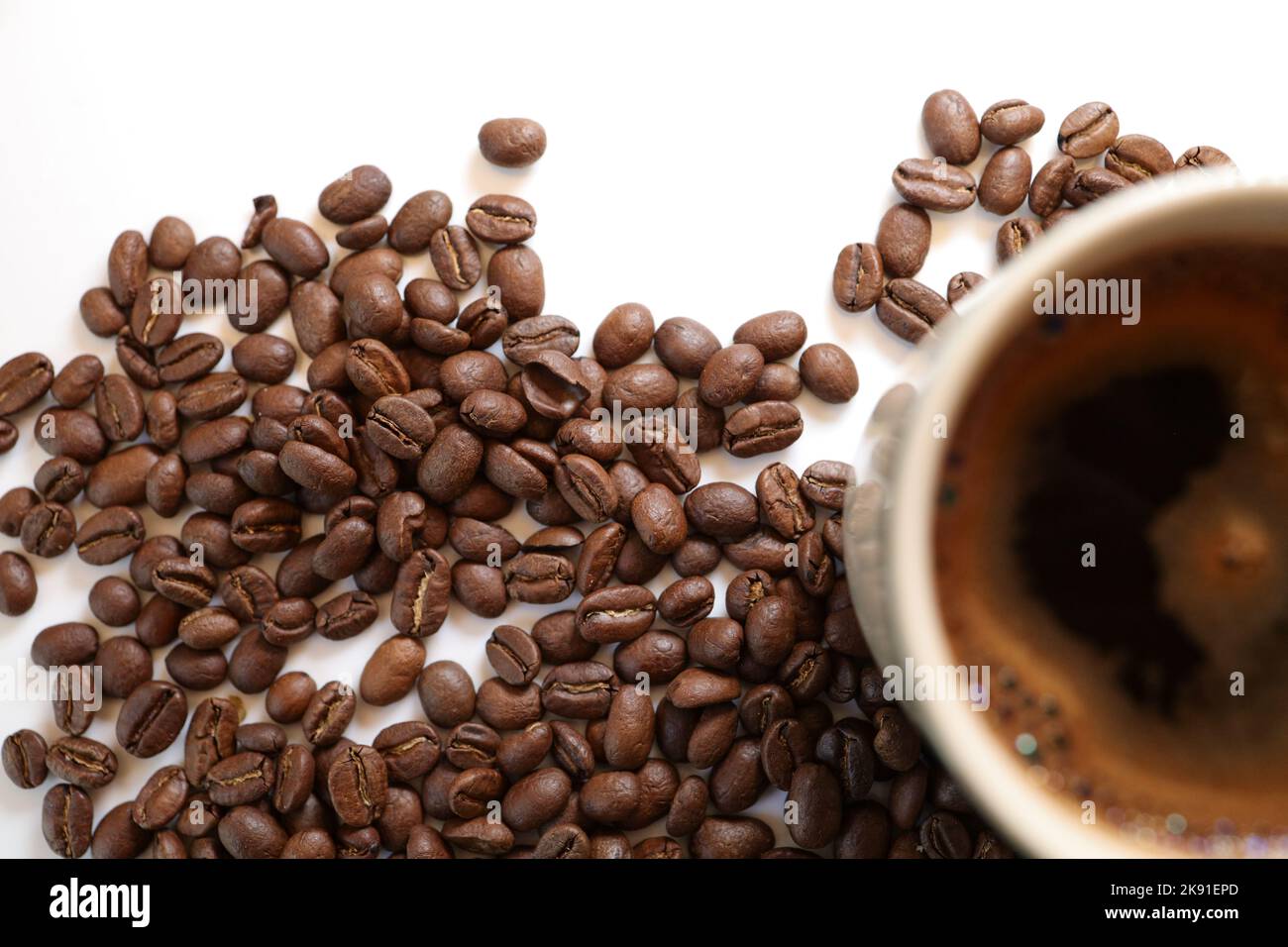 coffee beans on a white background with a cup of black coffee Stock ...