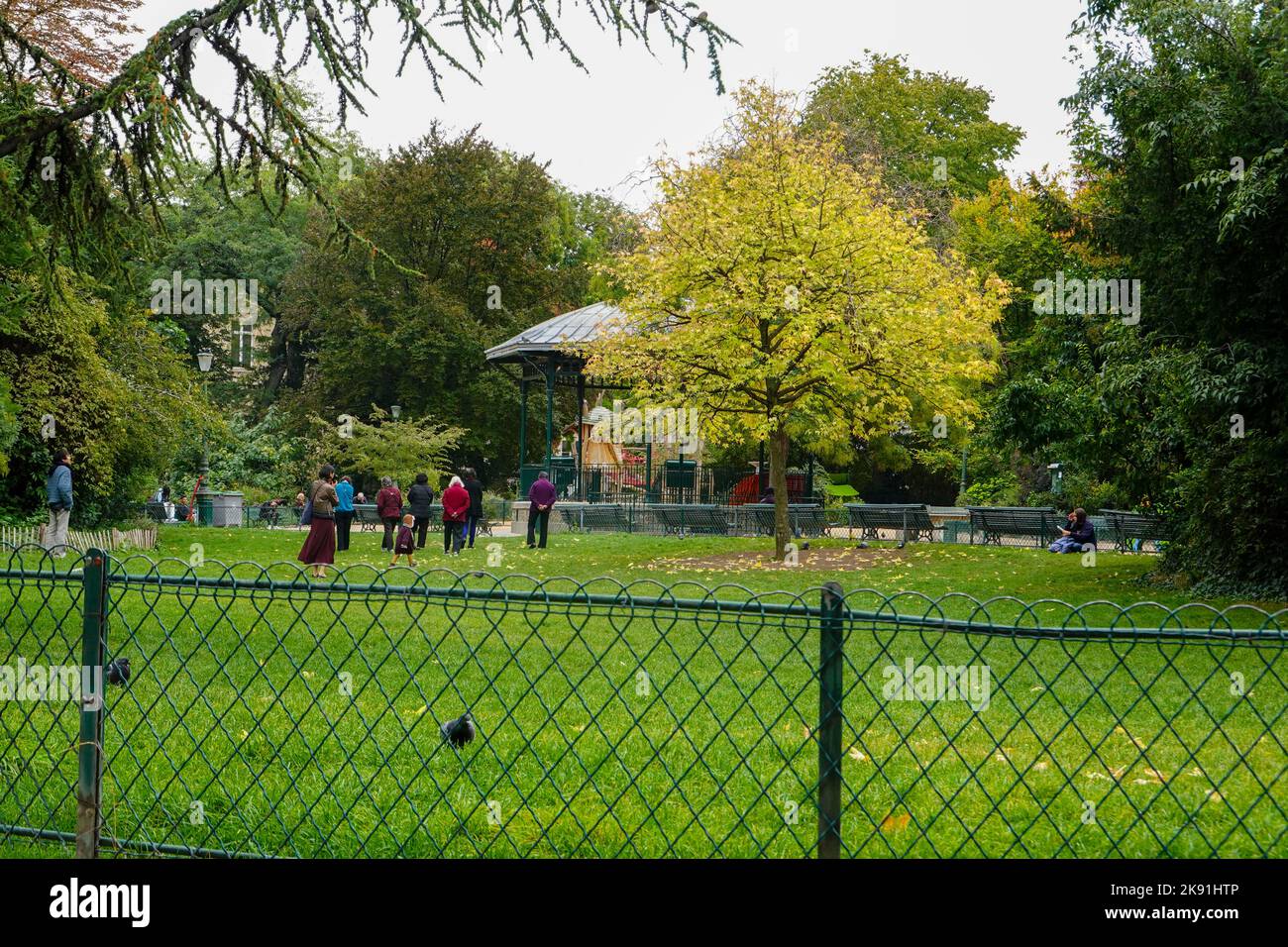 People Enjoying A Beautiful Autumn Day In Square Du Temple Elie people-enjoying-a-beautiful-autumn-day-in-square-du-temple-elie