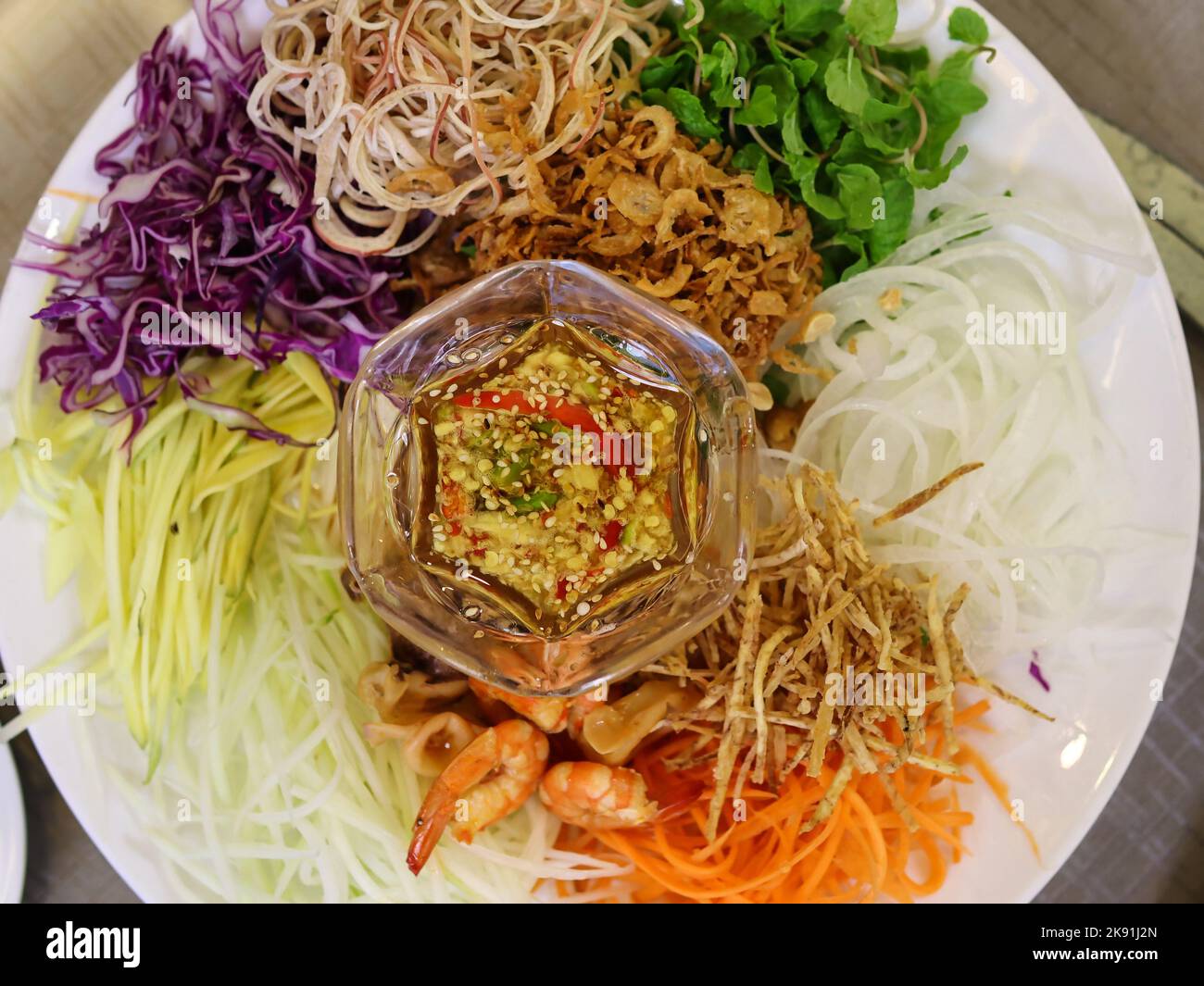 asian salad shrimp purple onion mango carrot papaya banana blossom with
