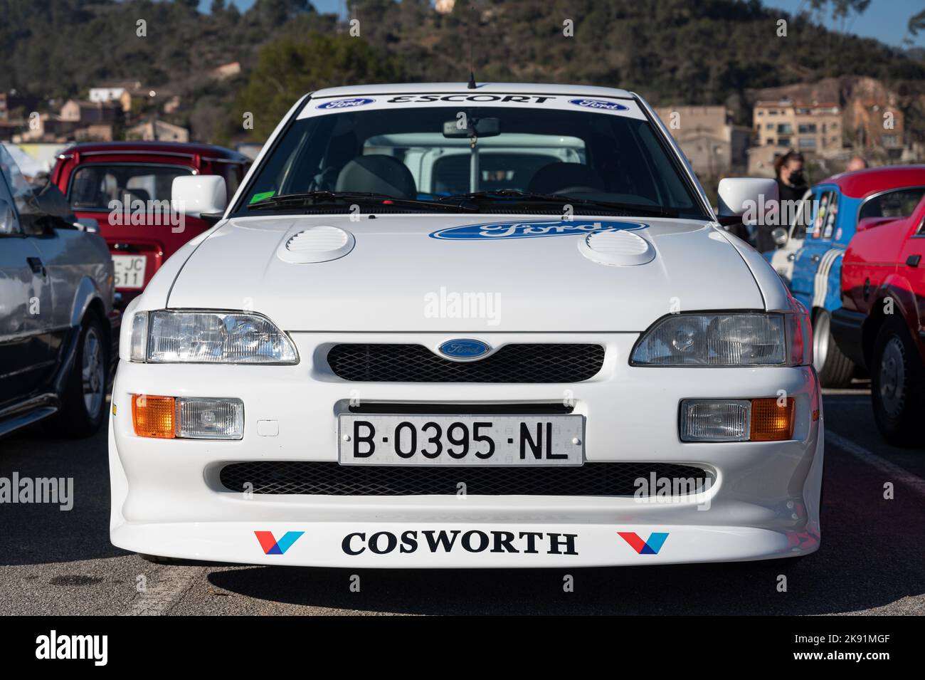 The white Ford Escort mk5 Cosworth rally car with Valvoline sponsor. Stock Photo