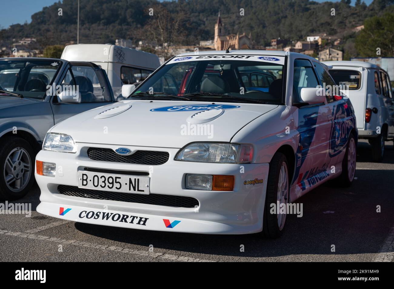 The white Ford Escort mk5 Cosworth rally car with Valvoline sponsor. Stock Photo