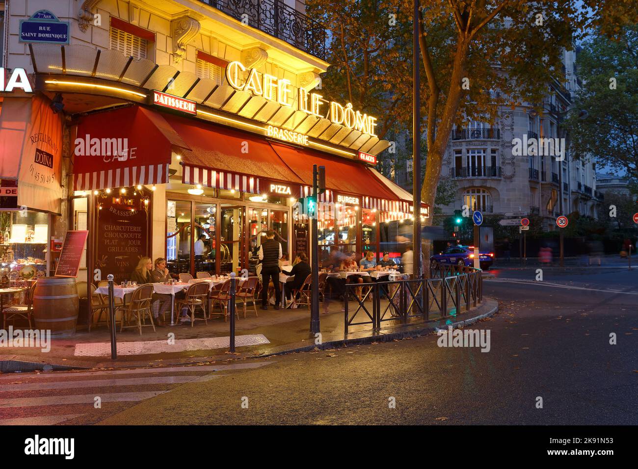 Cafe Le Dome is typical French cafe located near the Eiffel tower in Paris, France. Stock Photo
