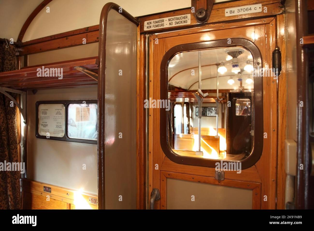 Interior of vintage preserved "Centoporte" Italian Railways train carriage  dating from the 1930s Stock Photo - Alamy