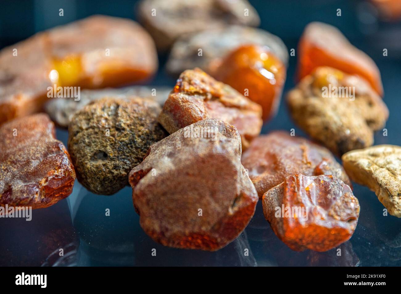 Raw amber from the shores of the Baltic Sea. Pieces of raw amber lie on