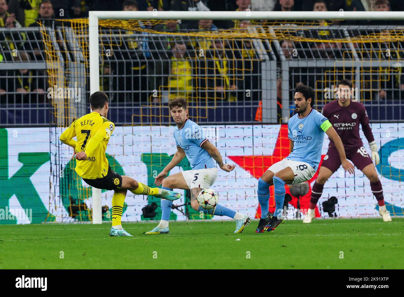 Munich's goalkeeper Stefan Ortega Moreno (R) catches the penalty shot by  Andreas Geipl of Regensburg (2-R) during the 2. Bundesliga relegation match  between Jahn Regensburg and TSV 1860 Munich at the Continental