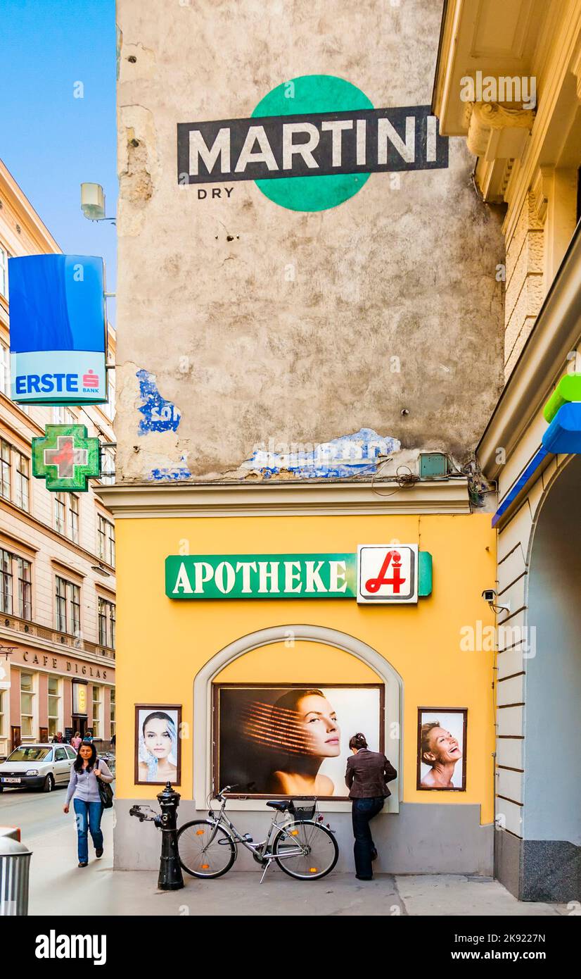 VIENNA, AUSTRIA APRIL 22, 2009 woman stands at a wall and watches
