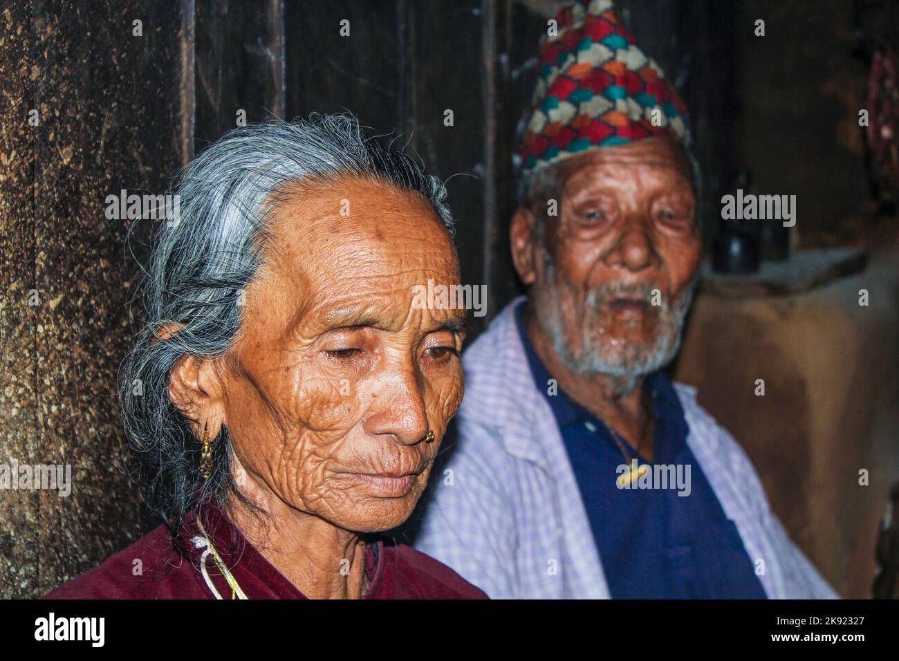 JOMSON, NEPAL - OCT 14, 2013: portrait of old nepalese woman. She wears a nose jewelry as symbol of wealth. Stock Photo