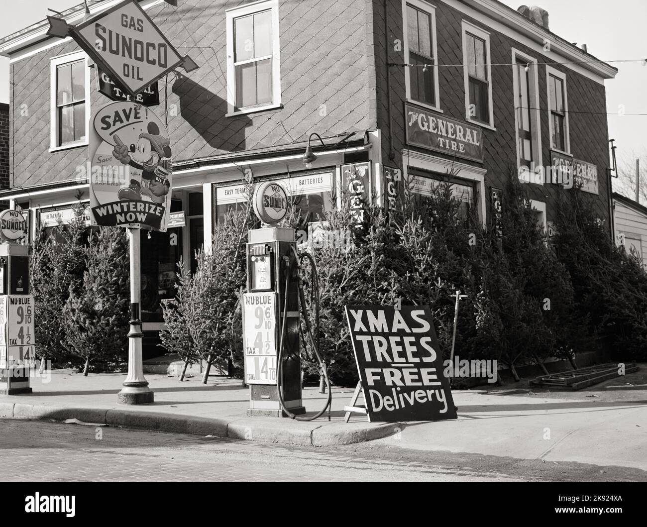 Christmas trees for sale at a Sunoco gas station. Woonsocket, Rhode