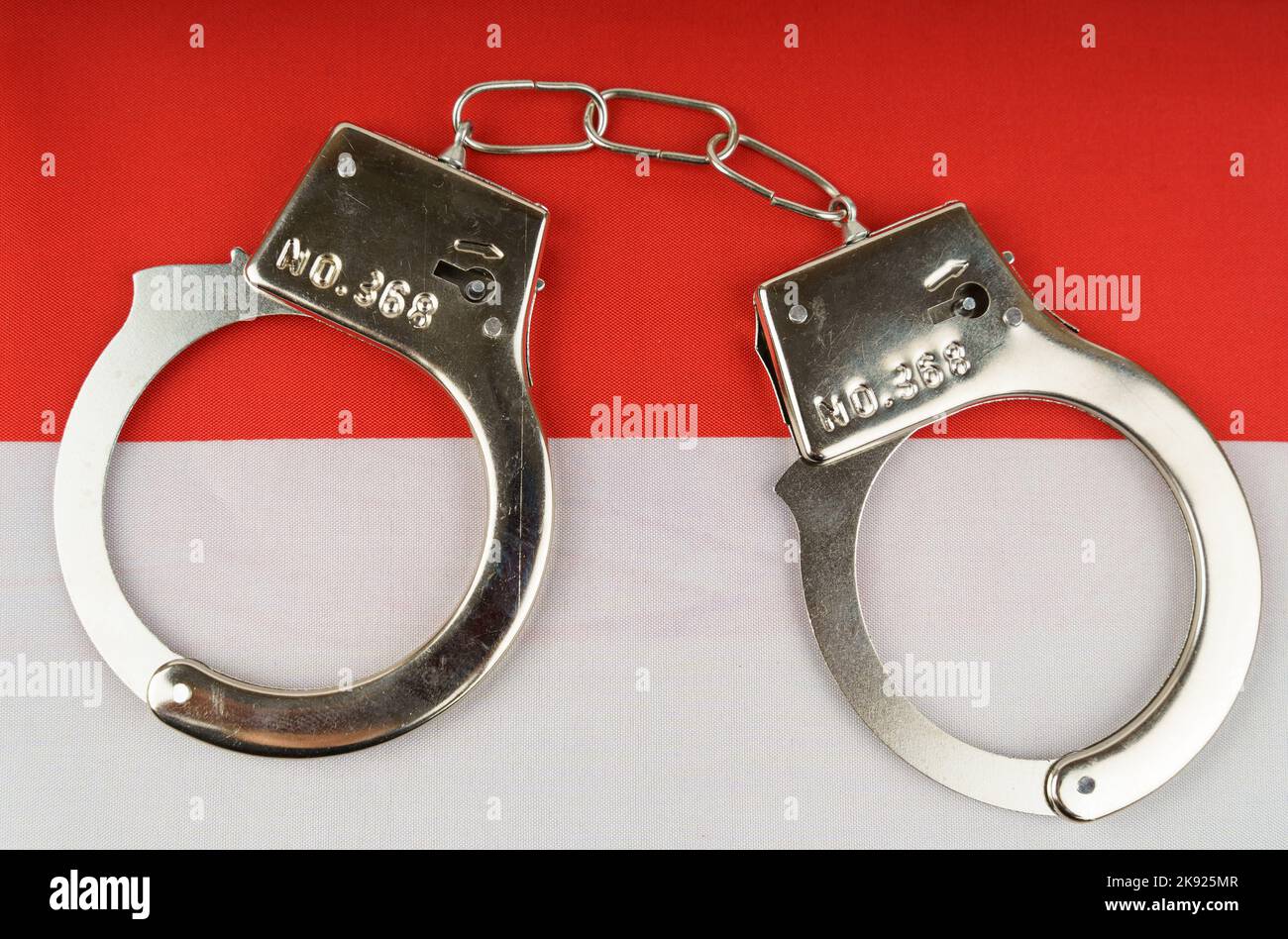 The concept of law and crime there are handcuffs on the flag of