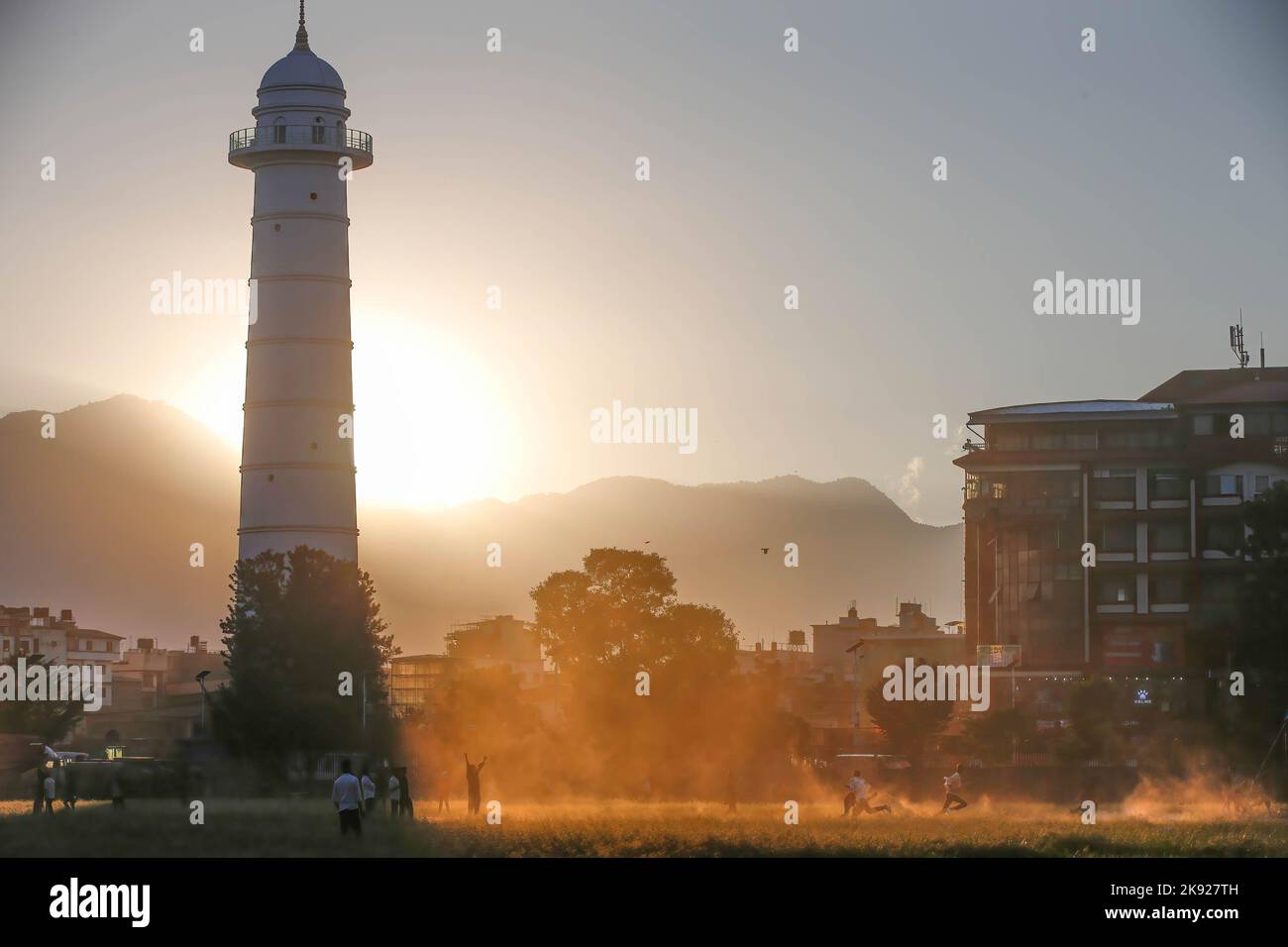 Kathmandu, Nepal. 25th Oct, 2022. People play football at the Tundikhel grounds during sunset in Kathmandu. (Credit Image: © Skanda Gautam/SOPA Images via ZUMA Press Wire) Stock Photo