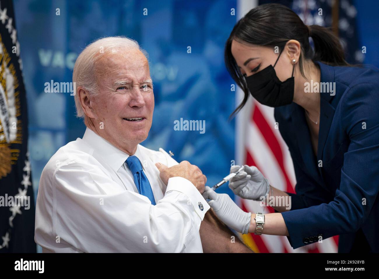 Washington, United States. 25th Oct, 2022. President Joe Biden prepares receives a booster dose of the Covid-19 vaccine targeting the Omicron BA.4/BA.5 subvariants in the Eisenhower Executive Office Building in Washington, DC, on Tuesday, October 25, 2022. The White House is asking businesses to help employees get updated coronavirus vaccines by hosting on-site clinics and will initiate a new program providing some Americans with free home delivery of Covid-19 treatments before an expected surge of the virus this fall. Photo by Al Drago/UPI Credit: UPI/Alamy Live News Stock Photo