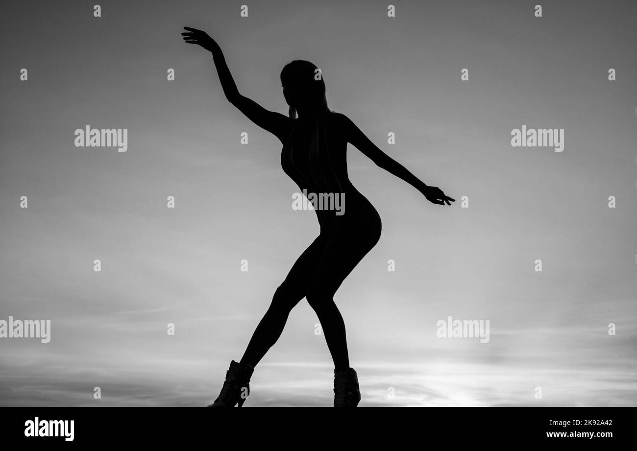the ultimate dancer. Woman ballet dancer in dusk. Dance girl