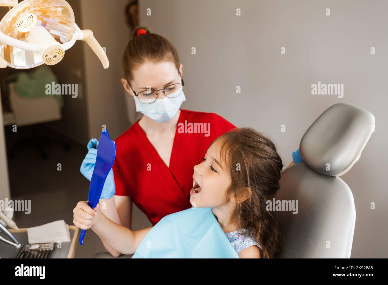 Children dentistry. Dentist and child patient. Consultation with child