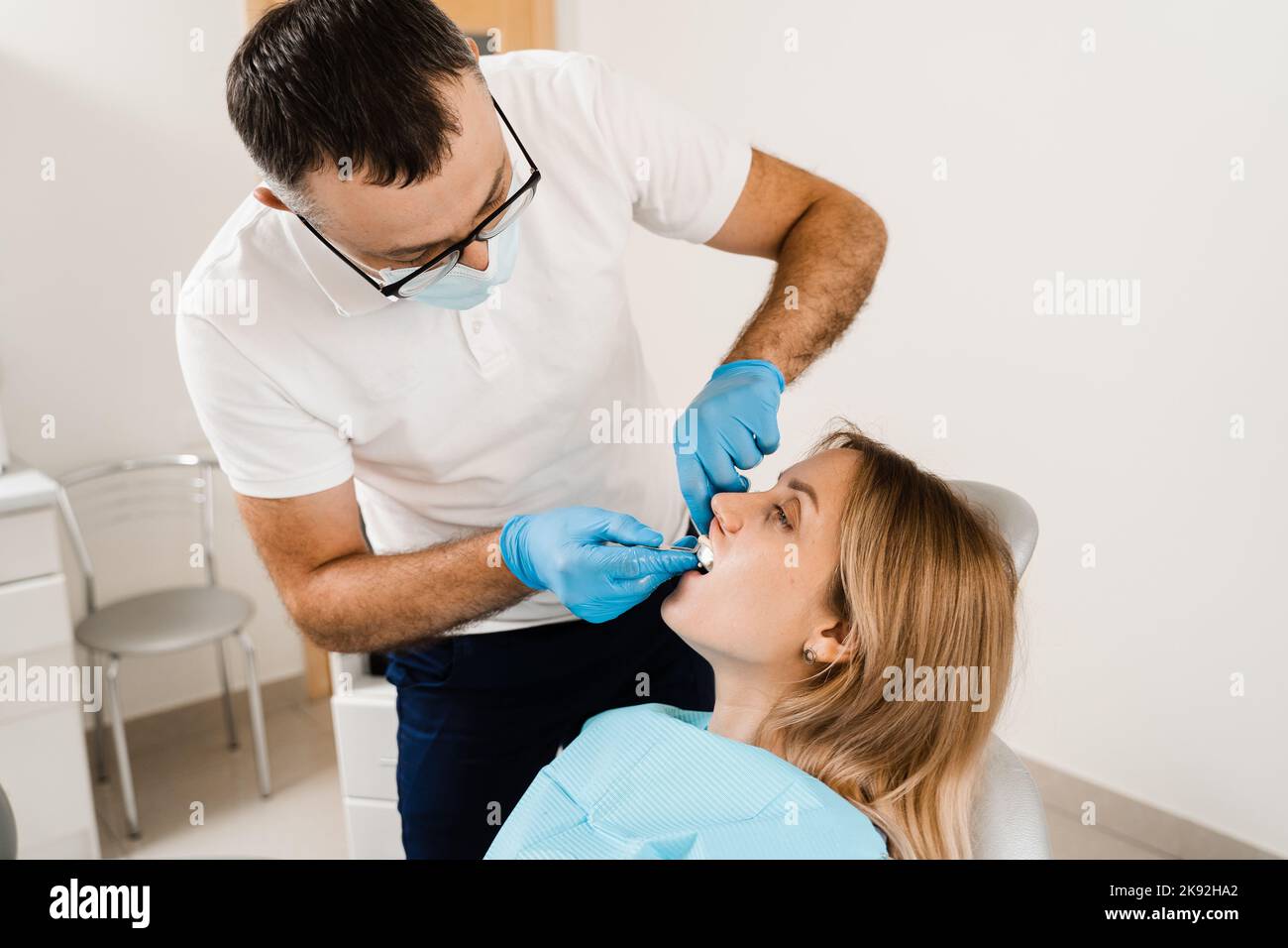 Orthodontist using dental putty to make teeth impressions of a patient  Stock Photo - Alamy