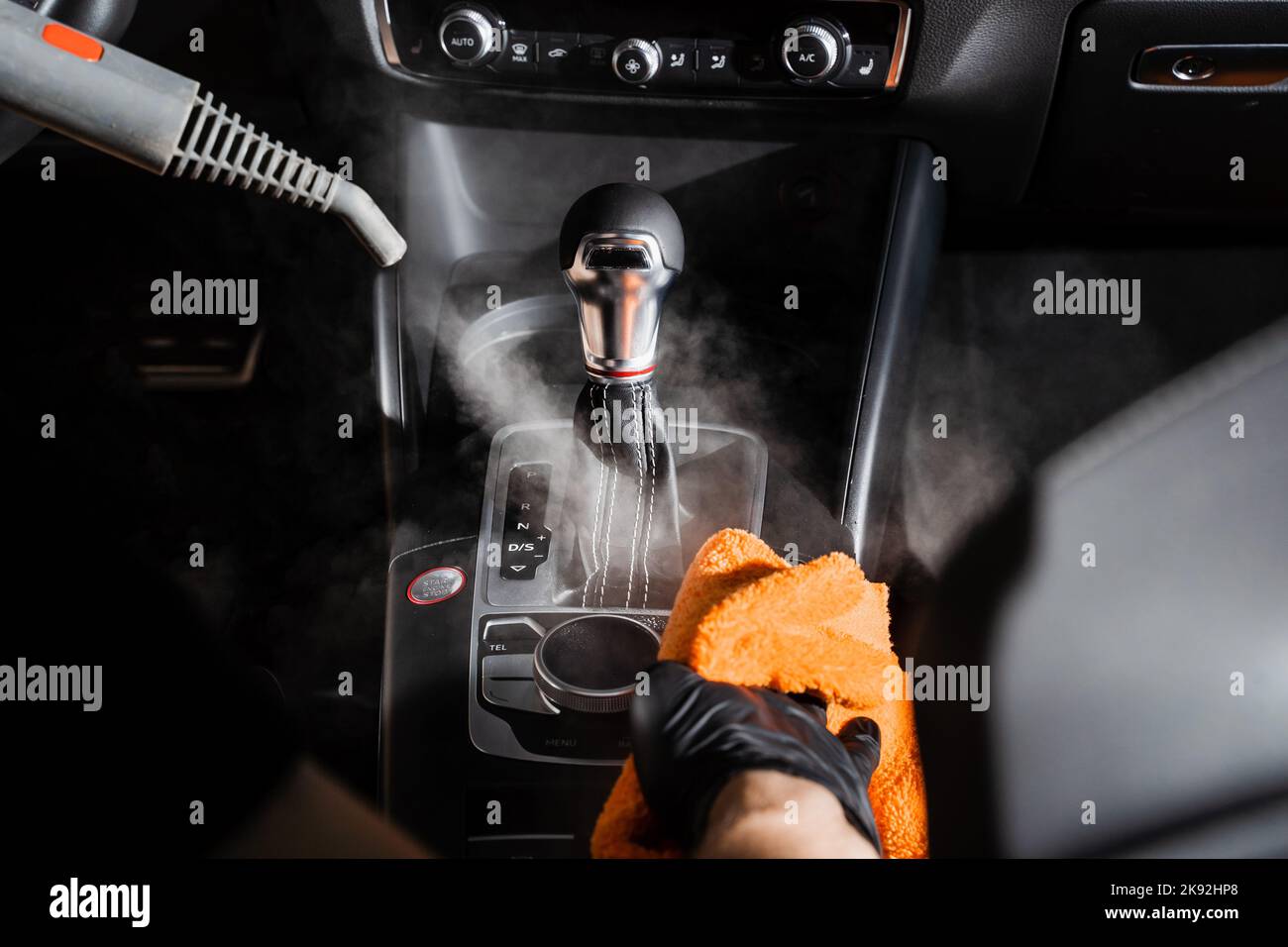 Car dashboard cleaning with steam hires stock photography and images