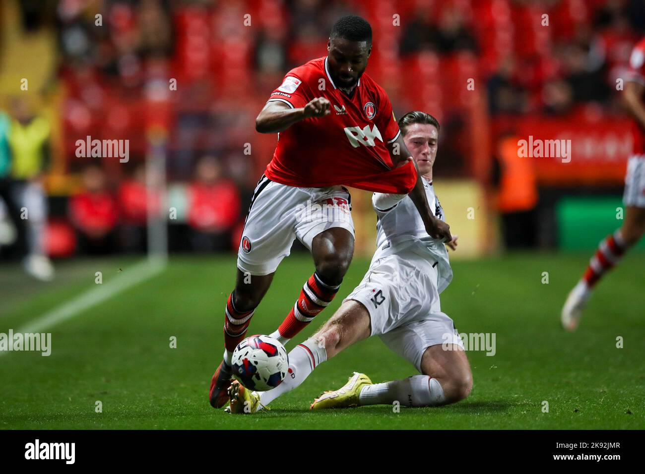 Mandela Egbo of Charlton Athletic battles for possession with Louie Barry of MK Dons during the Sky Bet League 1 match between Charlton Athletic and MK Dons at The Valley, London on Tuesday 25th October 2022. (Credit: Tom West | MI News) Credit: MI News & Sport /Alamy Live News Stock Photo