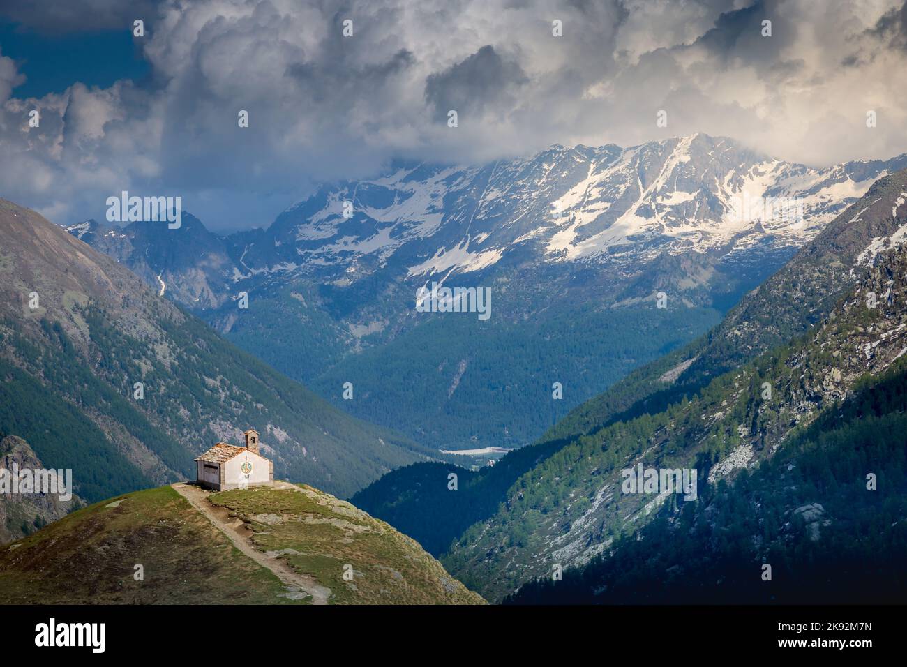 Chapel church above Idyllic Dolomites Alpine landscape, Gran Paradiso, Italy Stock Photo