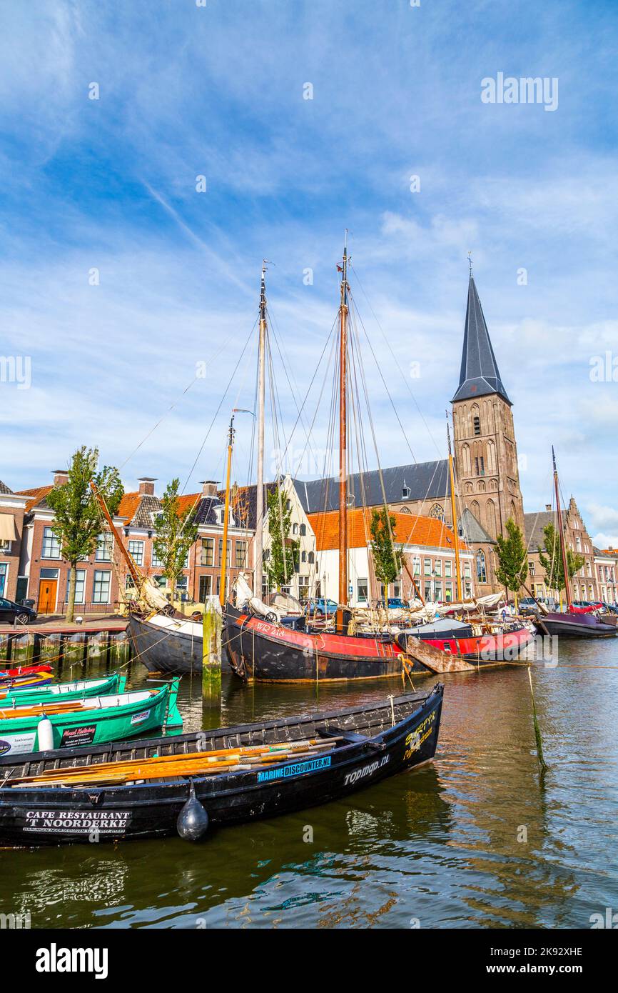 HARLINGEN, NETHERLANDS AUG 18, 2014 pier with old boats in Harlingen