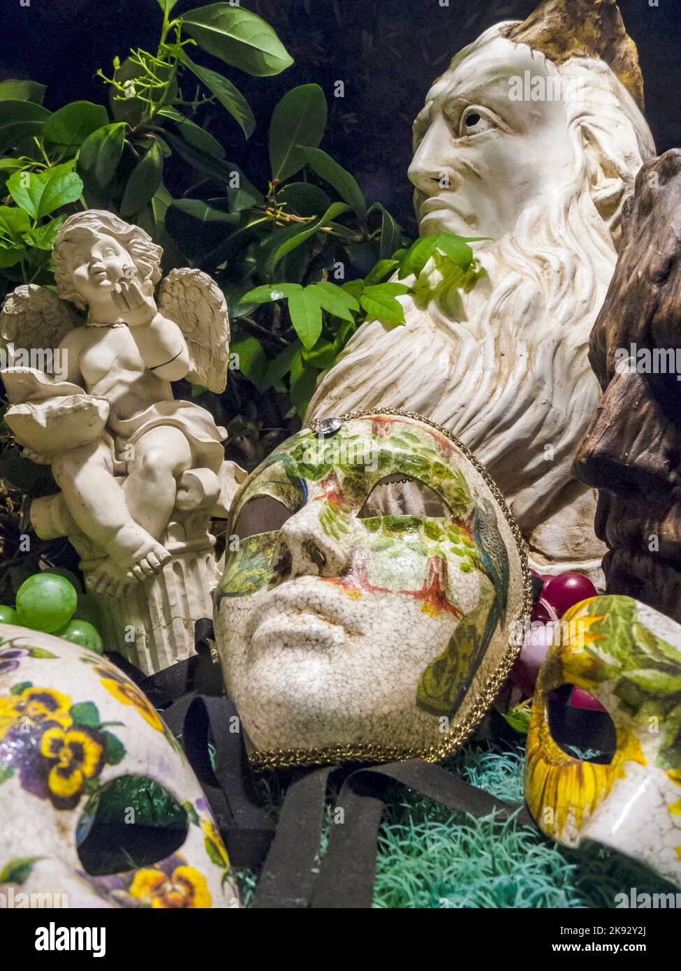 VENICE, ITALY - SEP 12, 2014: Venetian masks as symbol for the venetian carnival lying in the shop in Venice, Italy. Wearing a mask is an old traditio Stock Photo