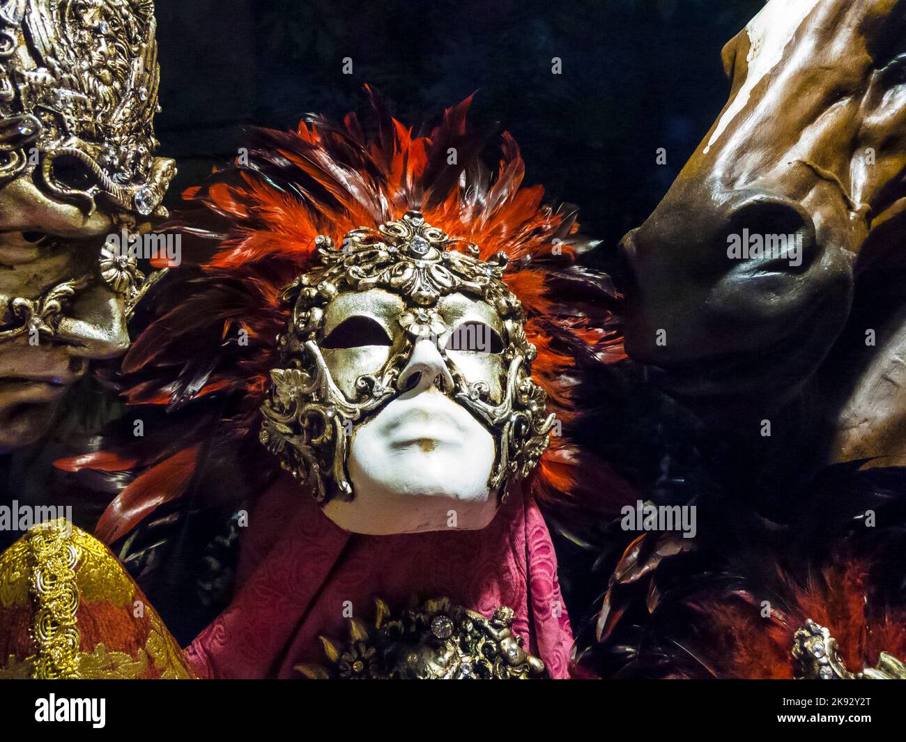 VENICE, ITALY - SEP 12, 2014: Venetian masks as symbol for the venetian carnival lying in the shop in Venice, Italy. Wearing a mask is an old traditio Stock Photo