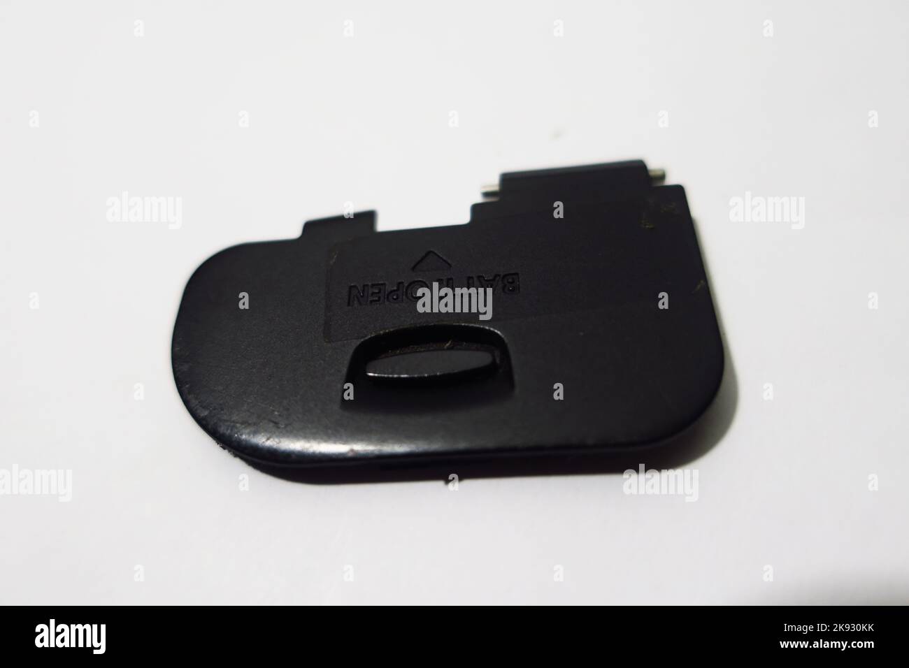 camera battery cover on white background Stock Photo Alamy