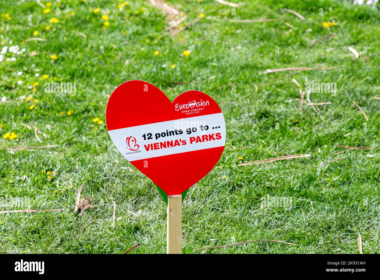 VIENNA, AUSTRIA - APR 27, 2015:  heart shape poster in the park for the european song contest in Vienna, Austria. Conchita Wurst was the winner in the Stock Photo