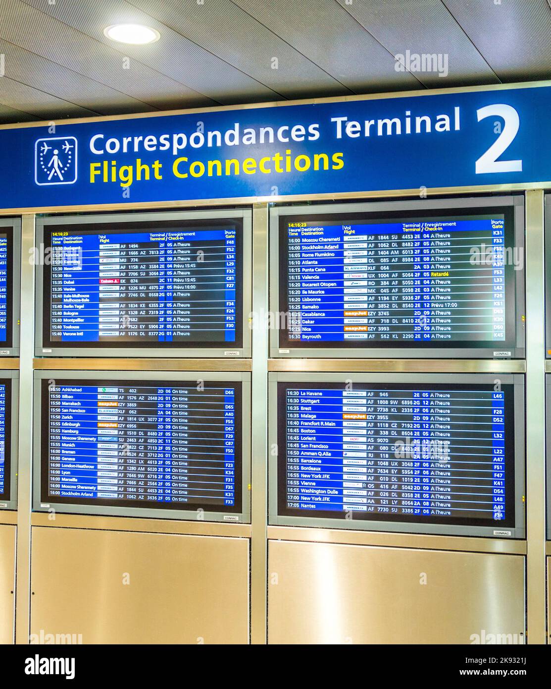 PARIS, FRANCE - JUNE 13, 2015: Charles de Gaulle  airport, hall of departures in Paris, France. A board with the schedule of departures of planes indi Stock Photo