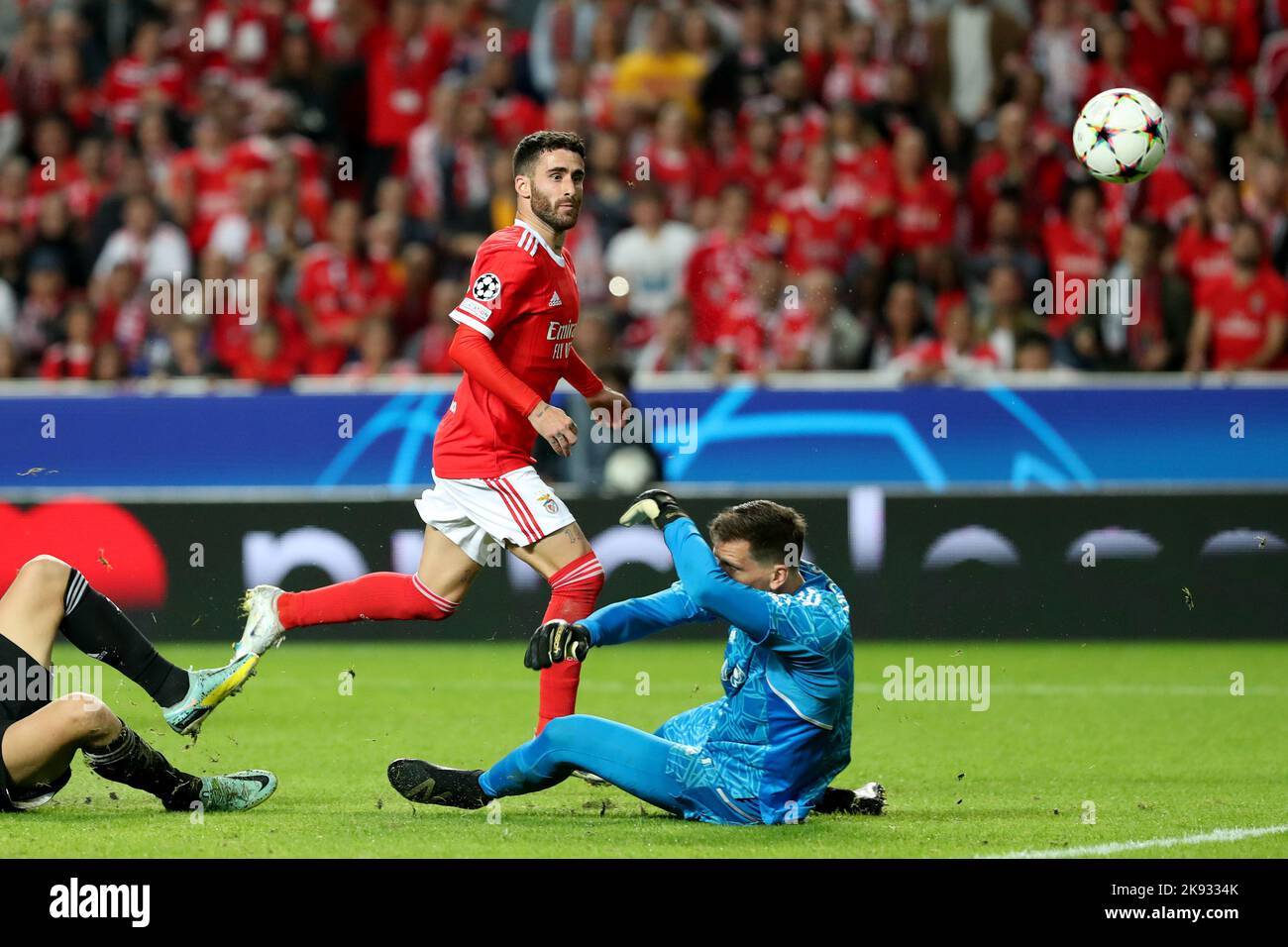 Lisbon, Portugal. 25th Oct, 2022. Rafa Silva (L) of Benfica scores during the UEFA Champions League group H match between SL Benfica and Juventus in Lisbon, Portugal, on Oct. 25, 2022. Credit: Pedro Fiuza/Xinhua/Alamy Live News Stock Photo