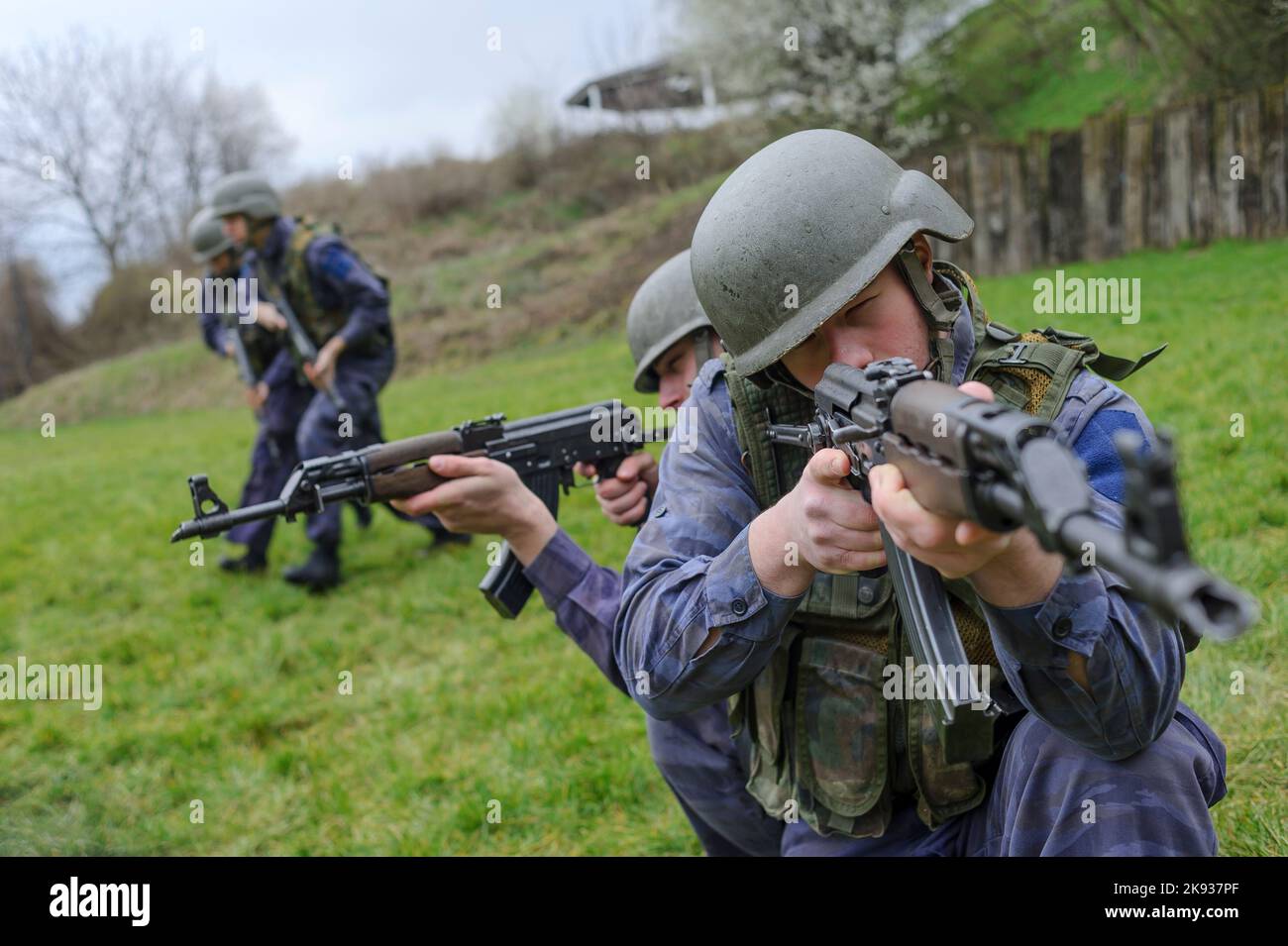 Student cadets od Serbian Police Academy (Kriminalisticko policijski univerzitet - KPU) train in basic combat tactics using assault rifles Stock Photo