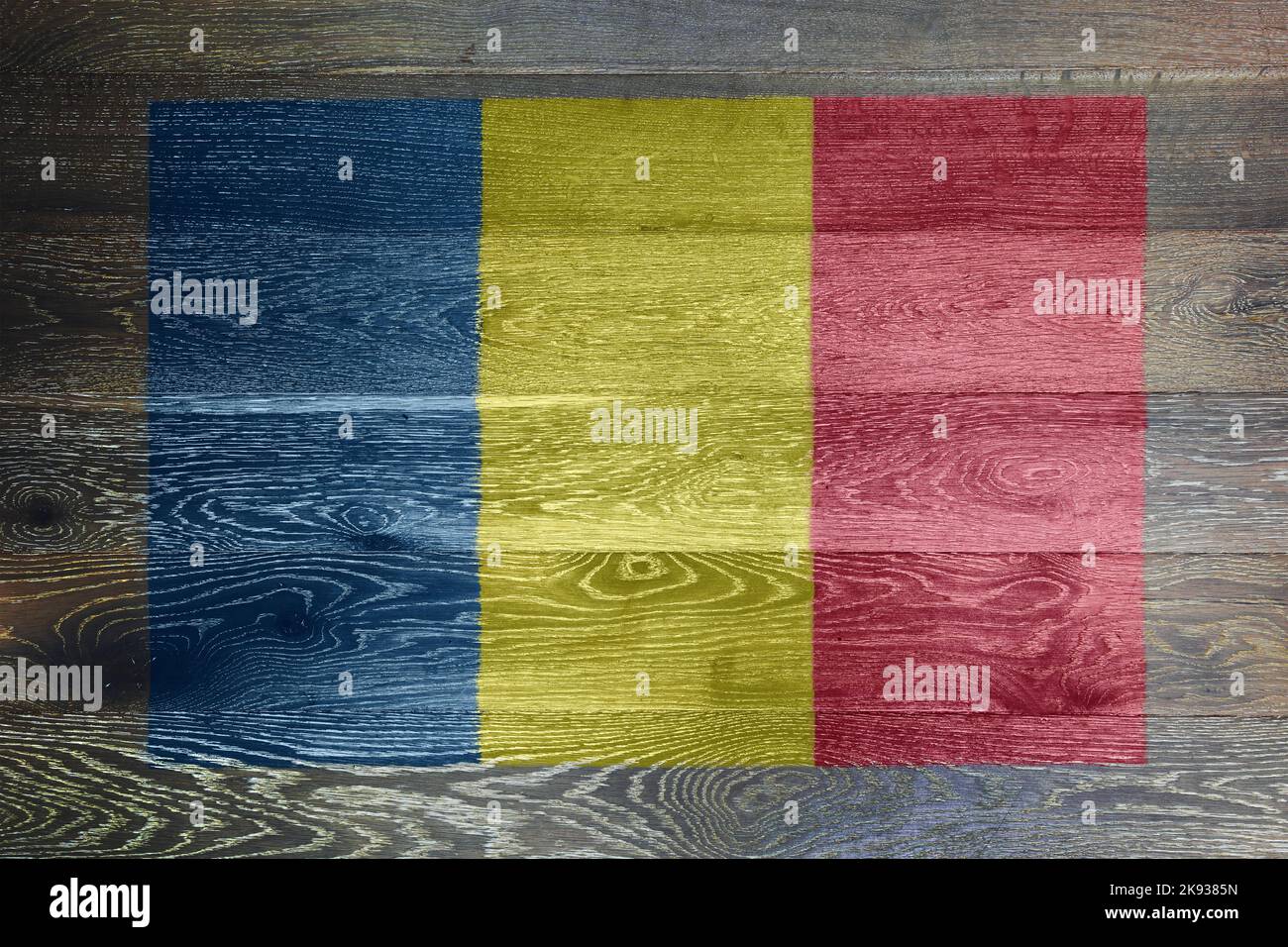Romania flag on rustic old wood surface background Stock Photo - Alamy
