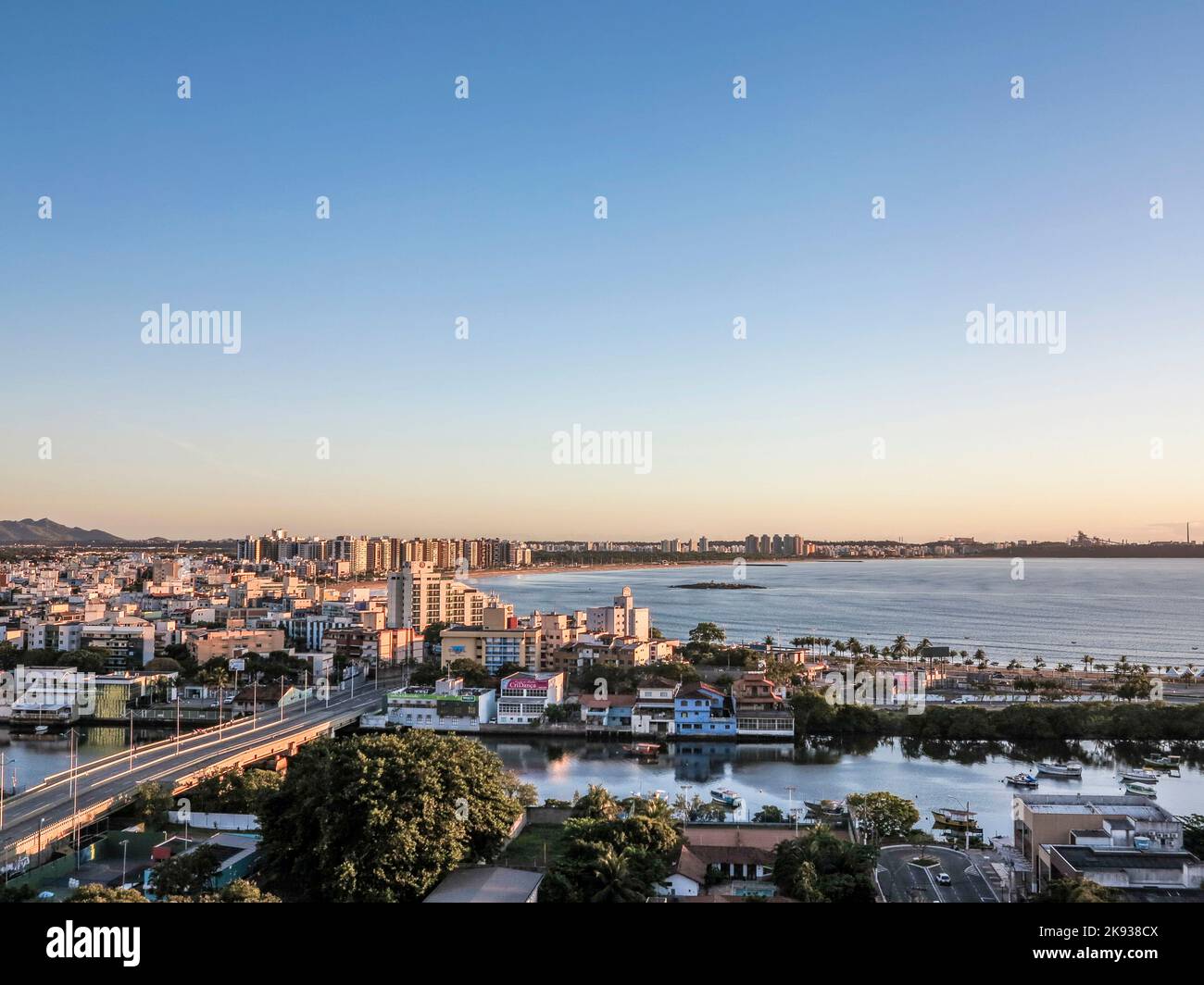 VITORIA, BRAZIL - OCT 27, 2013: aerial of Vitoria, Brazil in sunset. Vitoria has a population of 313 tst people in 2005 and covers an area of 93 squar Stock Photo